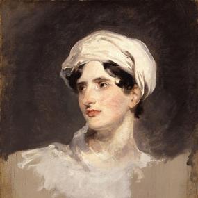 Head-and-shoulders painting of Maria Callcott by Sir Thomas Lawrence, 1819. She is in semi-profile, her head emerging from a white collar and vaguely-defined grey drapery. Her short, dark curls are mostly hidden by a white turban. The portrait later belonged to Elizabeth Rigby. National Portrait Gallery.