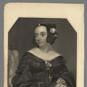 Black and white print of a portrait of Anna Maria Hall painted by Henry Thomas Ryall in the 1830s. She sits in a chair looking down and to the left, wearing a dark dress with a V neck, with flowers at her bosom and a crucifix hanging below. Her dark hair, parted in the middle, falls in short ringlets adorned with a large rose. She has a watch on her right wrist and holds a book in both hands. National Gallery of Wales.
