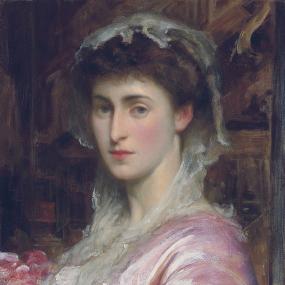 Photograph of a painting of Adelaide Kemble, painted with loose brushstrokes that give the painting the impression of softness. She is shown from the shoulders up, wearing a soft pink dress and holding flowers of a similar shade. She has a light, gauzy bonnet or scarf atop her dark, curly hair, which is pulled up and appears to be tied underneath the bonnet.