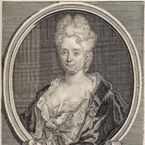 Photograph of a reversed engraving of Anne-Thérèse de Lambert, taken from a painting by Nicolas de Largillierre, c. 1710. She is shown from the waist up wearing (in the original) a blue velvet cloak over a gold-coloured bodice and white chemise, pinned at the front with a brooch. Her hair is powdered and frizzed in a high hair-style. The engraving contains the portrait in an oval frame with a scroll beneath, the whole apparently standing on a plinth. The scroll is engraved with her name and the salient fa