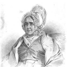 Stipple engraving of Mary Anne Schimmelpenninck by Fisher after a photograph by Henry Adlard, published 1858. She is sitting, wearing a tall, frilled cap and, it seems, both a shawl and a jacket over her dress. A scarf at her neckline has pinned to it a cross of the type called "cross pattée".