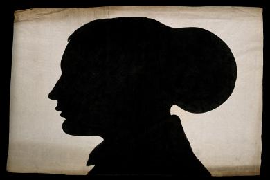 A silhouette of a human head, seen in profile