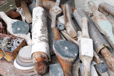 Colour photo of large pile of sculptor's tools