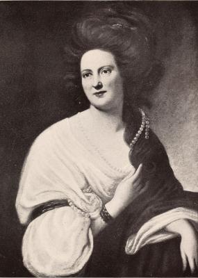 Black and white photo of a portrait of Elizabeth, Margravine of Anspach (while she was Countess of Craven, during her first marriage, i.e. 1767-83), by Francis Cotes. She has big hair mostly brushed back and trailing strings of pearls, and wears a loosely draped pale dress with plunging neckline, a dark shawl, and an armlet and bracelet.