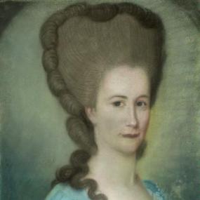 Head-and-shoulders portrait in crayon of Susanna Blamire by Giacomo Cambruzzi, c. 1777. She has a fashionably high hairstyle with some locks hanging loose behind, and a scoop-neck blue gown.