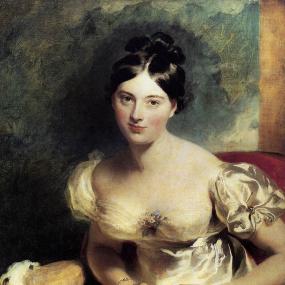 Painting of Marguerite Gardiner, Countess of Blessington, by Thomas Lawrence, 1822. She sits in a red chair with an ermine cloak beside her, wearing an ivory dress with short puff sleeves and low décolleté with a sprig of flowers. Her dark, lustrous hair is smoothed tightly back into loops behind her head.