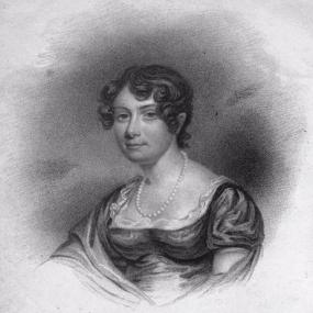 Stipple head-and-shoulders engraving of Mary Brunton by Henry Meyer after William John Thomson, 1833. She is wearing a dress with a low, square, lace-trimmed neckline and puffed, short sleeves, a shawl over one arm, and a string of pearls. Dark curls frame her face.