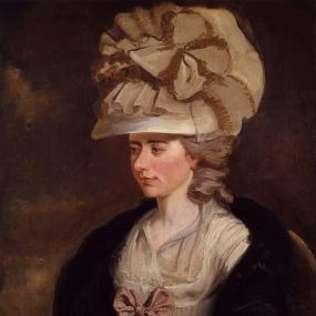 Photo of the painting of Frances Burney by her cousin Edward Francisco Burney, c. 1784-5. She is turned to the viewer's left with lowered gaze, wearing a long-sleeved pale pink gown with a pink bow and a dark shawl; but the portrait is dominated by her huge hat with puffed-up crown and bow of broad ribbon. National Portrait Gallery