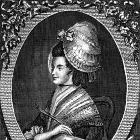 Black and white oval print of Jane Cave  in semi-profile, frontispiece to her first book, "Poems on Various Subjects: Entertaining, Elegiac, and Religious", Winchester, 1783. She is wearing an elaborate bonnet and, and a quill pen in her hand rests on a book in a surely impossible position for writing. The oval has a brick surround with decoration top and bottom, and her name in capitals: "Miss Jane Cave".