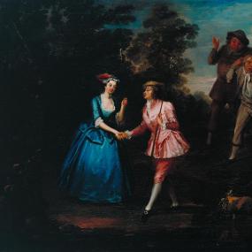 A painting by Willliam Jones, 1740, of Charlotte Charke playing a "breeches role", the male lead the one-act opera "Damon and Phillida" by her father, Colley Cibber. She is dressed in a pink (men's) jacket and breeches, white stockings, and men's shoes adorned with a buckle. The scene shows Damon reconciled with Phillida (to the left, dressed in blue) with two frustrated, mercenary suitors in the background. Tate Gallery.