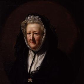 Portrait of Mary Delany, by John Opie, 1782. Her face and grey hair are enclosed by a white cap; she wears a dark cloak with a hood, white linen at her neckline, and a pendant.