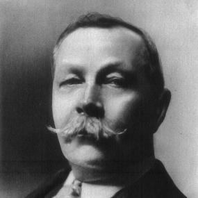 Arthur Conan Doyle, full-face with a tidy handlebar moustache: by the US photographer Arnold Genthe.