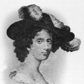 Black and white head-and-shoulders reproduction of a portrait of Hannah Webster Foster before 1840. She is wearing a large. stylish hat adorned with ostrich feathers, and a large lacy collar. Her dark hair is in curls.