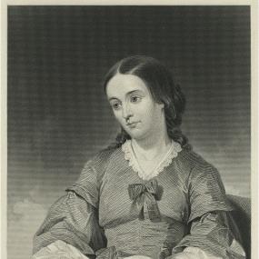 Half-length engraving of Margaret Fuller after a  painting by Thomas Hicks. She sits holding a book on her lap, wearing a dress with a bow at its V neck, her hair smooth in front and wavy behind.