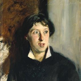 Head-and-shoulders portrait sketch of Vernon Lee by John Singer Sargent, done in a single three-hour sitting, 1881. Her hair is short and dark; she wears a black sweater over a white shirt, and wire-rimmed spectacles. Tate Gallery.