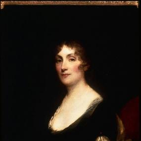 Half-length painting of Sarah Wentworth Morton  by Gilbert Stuart, c. 1802. She sits in a red chair looking at the viewer in half-profile, her dark hair and dress merging into the black background and only her face, décolletage, and forearms standing out dramatically, with a gold shawl at her elbows. Museum of Fine Arts, Boston, MA.