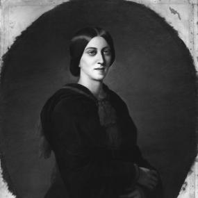 Black and white photograph of a painting of Adelaide Procter by Emma Gaggiotti Richards. She is wearing a simple dark dress with long, wide sleeves, and decorative red tassels hanging down the front and back, which are connected by a rope that sits around her shoulders. Her smooth dark hair is pulled back into a simple bun. The painting has a simple dark background, which blends out to reveal unpainted board at the edges. National Portrait Gallery.