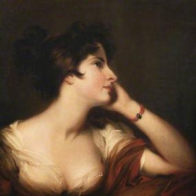 Head-and-shoulders painting of Maria Riddell by Thomas Lawrence, c. 1806. She sits with one bare, braceleted arm raised on her chair, her chin resting on her hand, and her face in profile gazing into the distance. Her empire-style, low-necked gown has a reddish shawl thrown round it, and her dark hair is cut short.