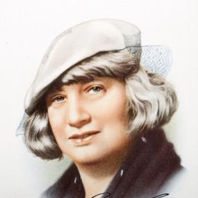 Colour, head-and-shoulders drawing of G. B. Stern, wearing a white cap and a black scarf. The edges of her image fade into the white
            background. The image was likely used on a pre-war cigarette card.