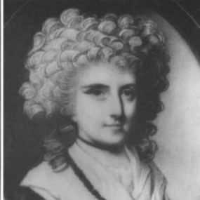 Black and white, head-and-shoulders photograph of an oval painting of Mary Eleanor Bowes, Countess of Strathmore, by an unknown artist. She has a large, folded white collar with black fringes, and her powderedhair is in high, tight curls.