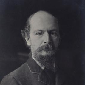 Black and white photograph of Algernon Charles Swinburne, full-face, 1890s.