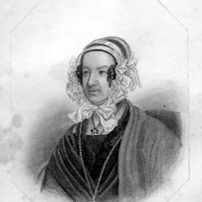 Photograph of a print of Charlotte Elizabeth Tonna by Francis Croll. She is seen from the shoulders up, wearing a simple dark dress with a grey shawl wrapped around her shoulders, and a light cap which is smooth on top, ruffled around the sides, and tied in a bow under her chin. A pendant on a long chain hangs round her neck. Her signature is reproduced below.