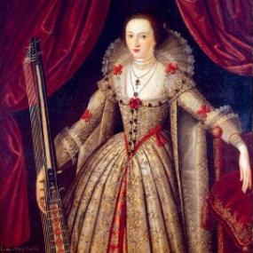 Full-length portrait of Lady Mary Wroth attributed to John de Critz the elder, c. 1620. She stands holding a theorbo that reaches to her shoulder, in a picture with striking touches of red. Wroth's stiff, embroidered gown and large, transparent ruff are pale; her petticoat and belt are red, and her arms, shoulders, and bust are picked out with red bows. She rests an arm of a red sofa, with red curtains behind.