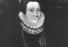Portrait of Anne Bacon Looking at towards audience. She is wearing a ruffled collar over a dress with jewellery. She is holding a small book in her right hand.